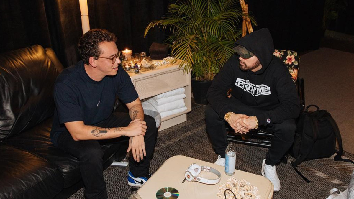 Logic with Eminem, sitting backstage