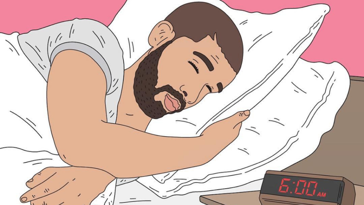 Drake sleeping in bed.